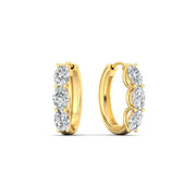 oval-shaped-huggie-hoops-3-stone-earrings-in-yellow-gold-fdear11727angle1-nl-yg_4f3c228c-6b63-4bc9-9e4f-3b5d1540acea.jpg?v=1776316096